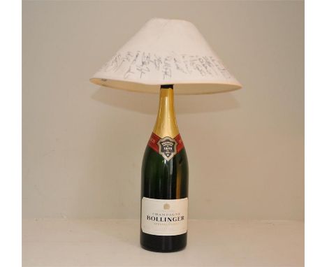 A lamp shade signed by the Sussex squad of 2003 on the day that Sussex won the County Championship for the first time and sol