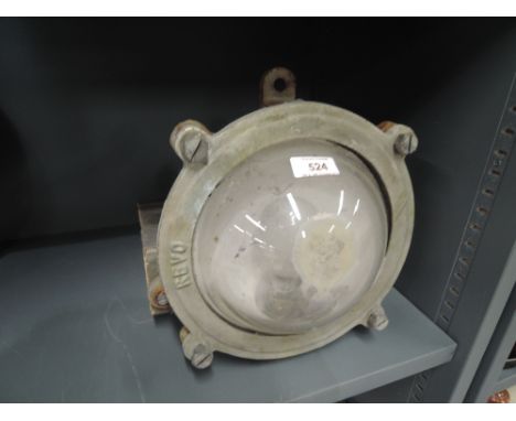 A vintage bulkhead light with bulls eye glass