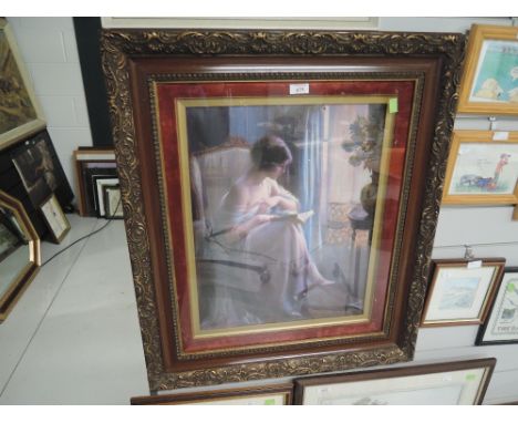 A vintage print with ornate frame
