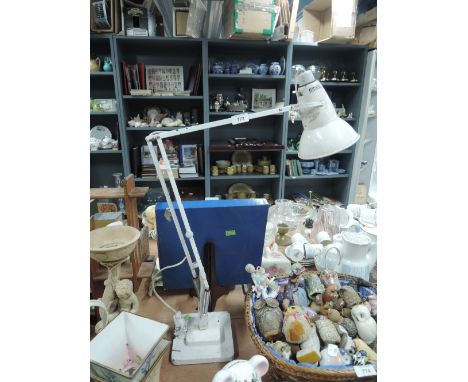 An angle poise lamp