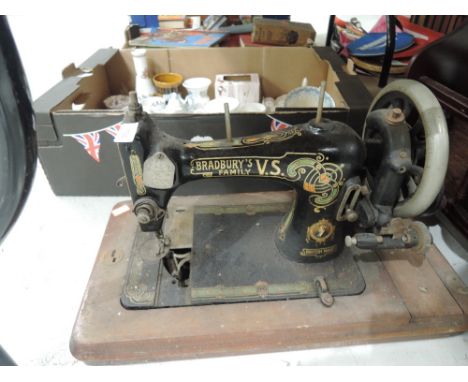 A vintage hand cranked sewing machine by Bradbury's family V.S`