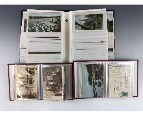 Three vintage postcard albums 