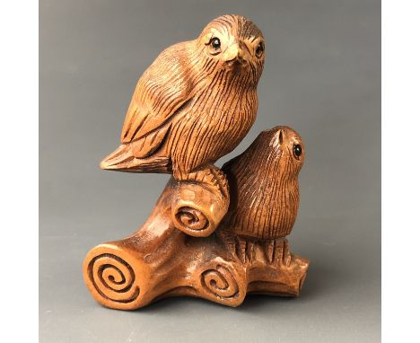 A Japanese carved wood netsuke modelled as a bird and chick