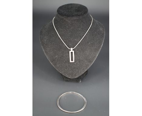 A contemporary Beaverbrook modernist silver pendant necklace and bangle in original packaging 