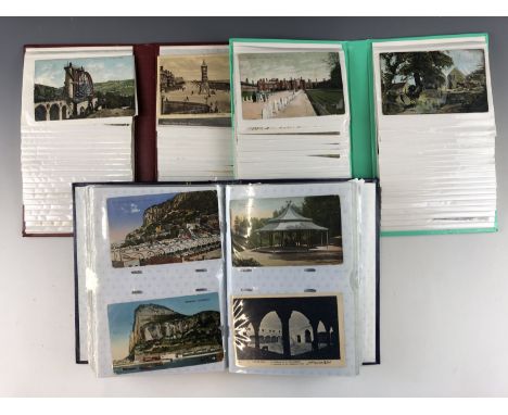 Three vintage postcard albums