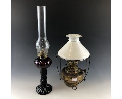 A Victorian pendant oil lamp with milk glass shade, together with one other oil lamp
