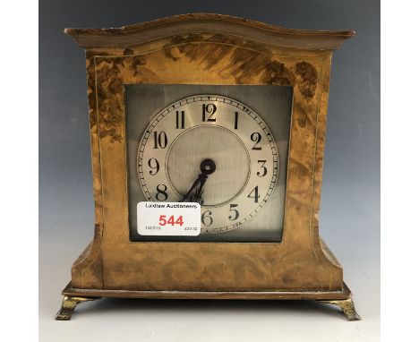 A 1930s Buren mantel clock, in a string-inlaid and walnut veneered case with diminutive brass ogee bracket feet, 18 cm