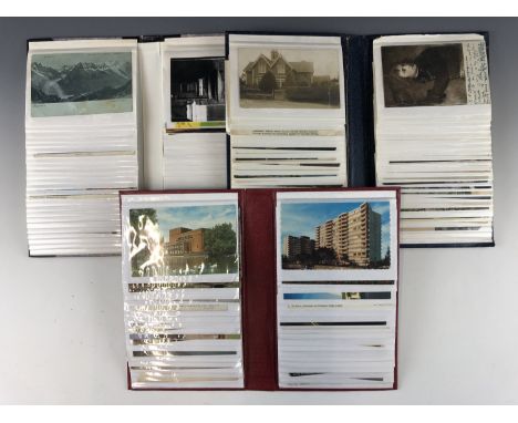 Three vintage postcard albums 