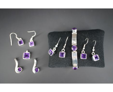 A quantity of contemporary amethyst and white metal (tests as silver) jewellery, including a bracelet, princess-cut pendant, 