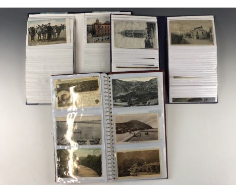 Three vintage postcard albums 