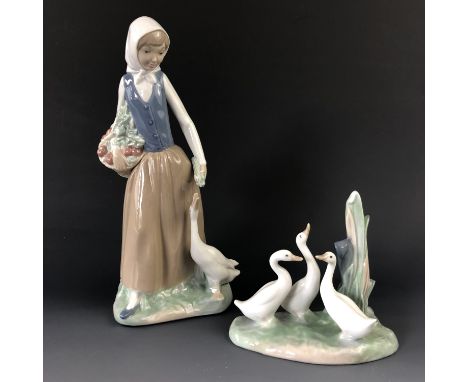 Two Nao porcelain figurines comprising a young woman with geese, and a geese group