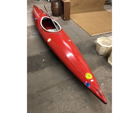 A vintage Ottersports fibreglass canoe, circa 1970s-1980s