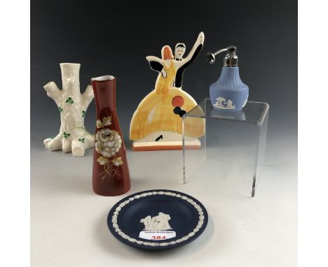 Ceramics including a Belleek vase, Wedgwood Jasper Ware perfume atomizer and a Clarice Cliff style figurine by Past Times