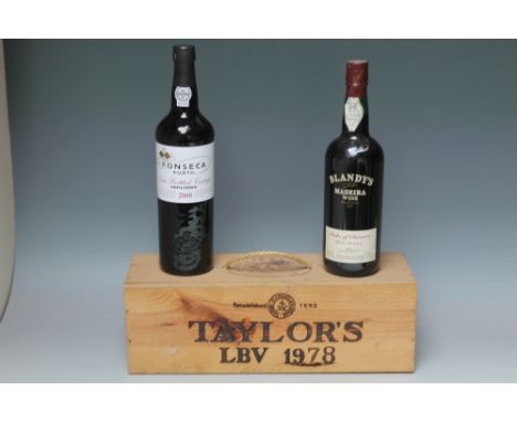 AN UNOPENED WOODEN CASE OF A MAGNUM OF TAYLOR'S LBV 1978 PORT, together with one bottle of Fonseca lbv 2008 port and one bott