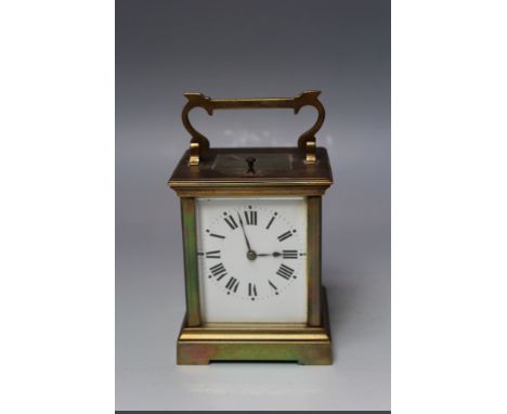A FRENCH BRASS CARRIAGE CLOCK, striking on a coil, with repeat button to the top, H 16 cm