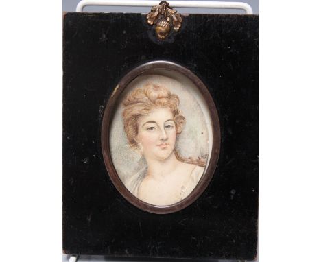 A NINETEENTH CENTURY OVAL PORTRAIT STUDY OF A YOUNG WOMAN, indistinctly signed middle right, watercolour, framed and glazed, 