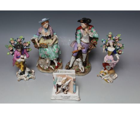 A PAIR OF CONTINENTAL MUSICIAN FIGURES, the lady holding a tambourine and having a sheep at her feet, the gentleman having a 