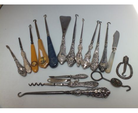 A COLLECTION OF SILVER HANDLED BUTTON HOOKS ETC, various dates and makers, to include a small selection of manicure items (18