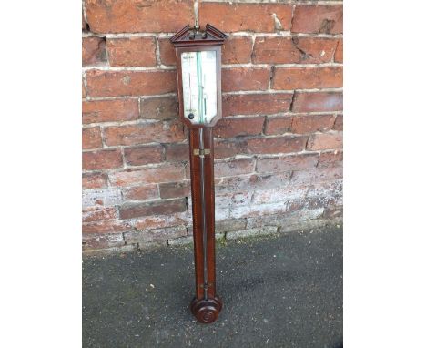 A 19TH CENTURY MAHOGANY STICK BAROMETER BY A POZOLY - LONDON, with swan neck pediment over an engraved silvered register with