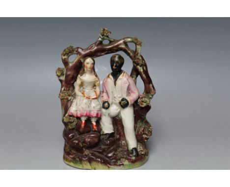 A SMALL STAFFORDSHIRE FLATBACK MODEL OF LITTLE EVA AND UNCLE TOM, H 15 cm