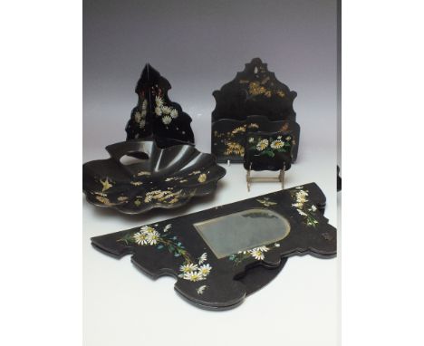 A COLLECTION OF FIVE ASSORTED PIECES OF BLACK LACQUER JAPANNED WARE, to include a mirrored folding wall bracket, letter rack 