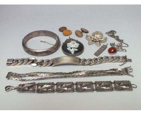 A COLLECTION OF SILVER AND WHITE METAL JEWELLERY, to include a hallmarked silver identity bracelet (free from engraving), and