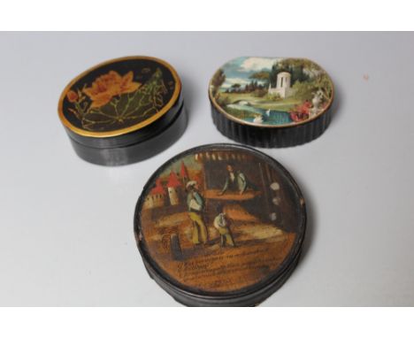 A PAPIER MACHE SNUFF BOX, decorated to the lid with a folly in the grounds of a large garden to the lid, together with a circ