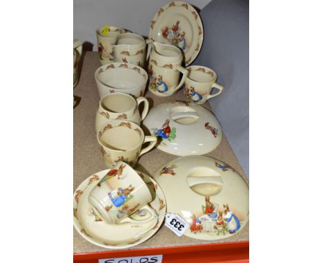 TWELVE PIECES OF ROYAL DOULTON BUNNYKINS EARTHENWARE TABLEWARES OF SCENES BY BARBARA VERNON, comprising seven pieces Feeding 