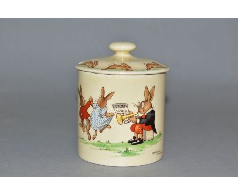 A ROYAL DOULTON BUNNYKINS EARTHENWARE JAM POT, Lambeth Walk, HW16, first version designed by Barbara Vernon, reverse Top Hat 