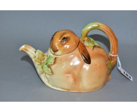 A 1930'S/40'S ROYAL DOULTON BUNNYKINS EARTHENWARE TEAPOT, D6010, designed by Charles Noke, shaped as a brown rabbit, with bra