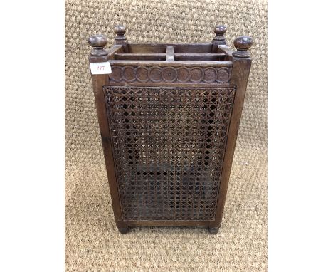 A 1920s caned stick stand