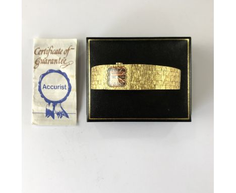 A lady's vintage gold-plated Accurist wrist watch, with manual-wind movement, tiger's eye dial and bark-effect bracelet strap