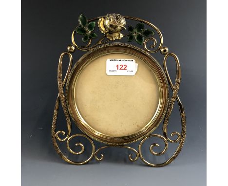 A brass easel-back photograph frame, 22 cm