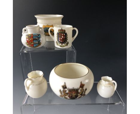 A small quantity of W. H. Goss crested china and two miniature doll's house jugs 