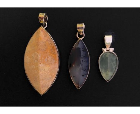 Three contemporary silver / white metal (tests as silver) and polished stone pendants, including a lenticular fossil coral dr