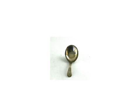 A George III silver Old English pattern caddy spoon, Elizabeth Morley, London 1802, with oval bowl, contemporary monogram.