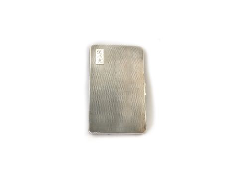 A large rectangular silver engine turned cigarette case, Chester 1945, 14cm wide, 7ozs.