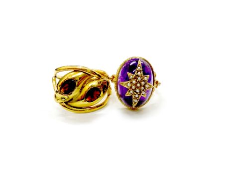 Two gold rings, comprising; an early 20th century 9ct gold and garnet two stone ring in the form of entwined snakes, with scr