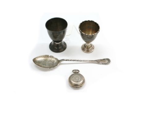 A George V circular silver engine turned sovereign case, A L Davenport, Birmingham 1910, a Victorian silver preserve spoon, B