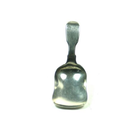 A Victorian silver fiddle pattern caddy spoon, makers mark unclear, London 1842, with hourglass shape bowl, monogrammed.
