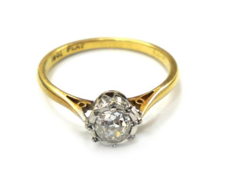 An early 20th century gold and diamond solitaire ring, the cushion shaped old cut stone approximately 0.35cts, grain set in w