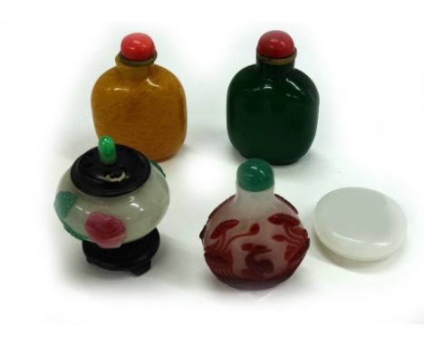 A Chinese miniature opaque glass jar, applied with pink flowers with green stems and leaves, carved and pierced cover with ja