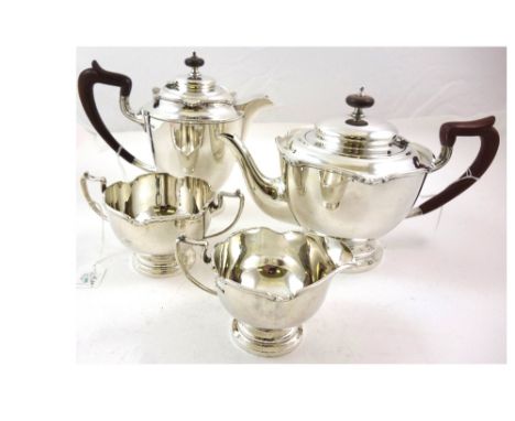 A four piece Art Deco silver tea service, Mappin & Webb, Sheffield 1928, circular tapering with shaped moulded borders, 58ozs