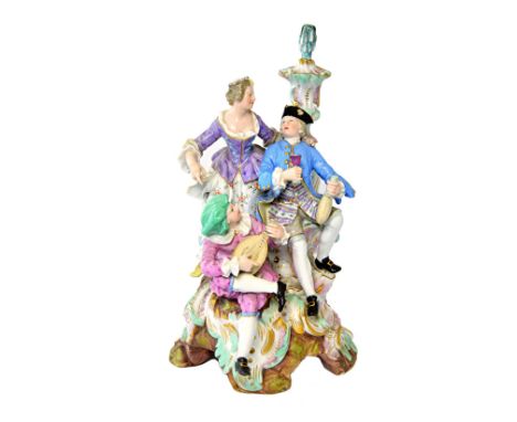 A Meissen porcelain figure group, second half 19th century, the three carousing figures, one playing a stringed instrument, s