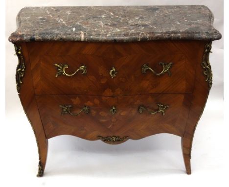 A reproduction Louis XV style kingwood gilt metal mounted bombe commode, the moulded serpentine edge marble top above two dra