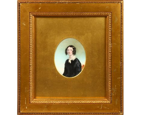 A VICTORIAN GILT FRAMED OVAL PORTRAIT OF A LADY, seated in a black dress and white scarf. 3.5ins x 2ins.