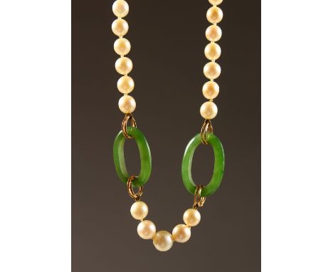 A CHINESE PEARL AND JADE NECKLACE, with gold clasp. 8ins long.