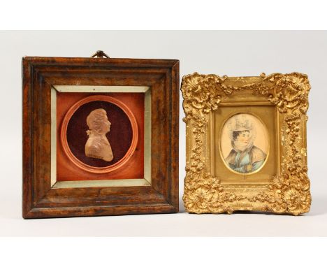 A GEORGE III CIRCULAR WAX PORTRAIT OF A MAN, 3.5ins diameter, framed and glazed, and A GILT FRAMED MINIATURE OF A LADY (2).
