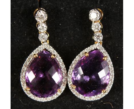 A PAIR OF 18CT YELLOW GOLD, PEAR SHAPED AMETHYST AND DIAMOND DROP EARRINGS of 6.4cts.