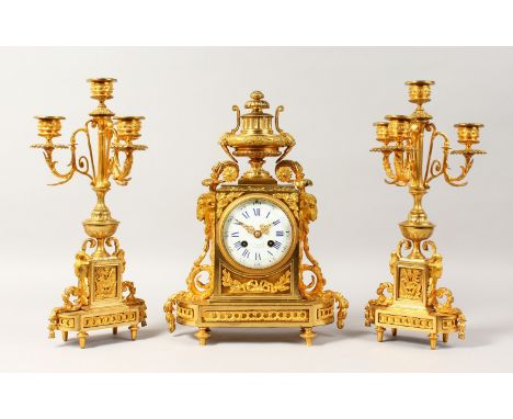 A GOOD 19TH CENTURY FRENCH GARNITURE DE CHEMINEE, the clock by A. CHAPUS, R. de Rivoli 86, urn finial and eight-day movement,